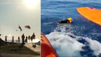 aterrador momento en el que dos parapentes chocan en el aire y caen al agua