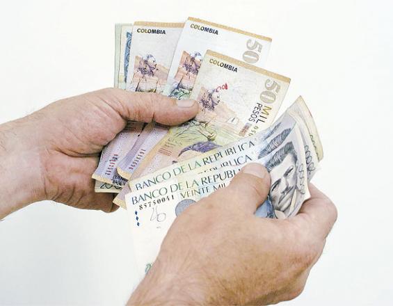 Así quedaría el salario mínimo en Colombia para el 2022 vendedora / salarios mínimos