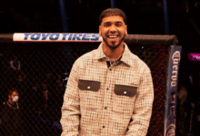 Anuel AA se tap&oacute; el tatuaje de su espalda que se hizo por Karol G