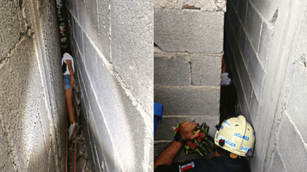 Ni&ntilde;a qued&oacute; atrapada entre dos paredes por intentar rescatar a unos gatos